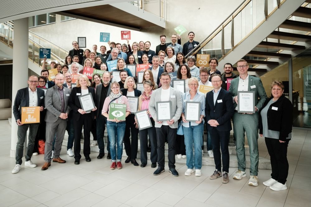 Dieses Foto zeigt die Teilnehmenden der Abschlussveranstaltung